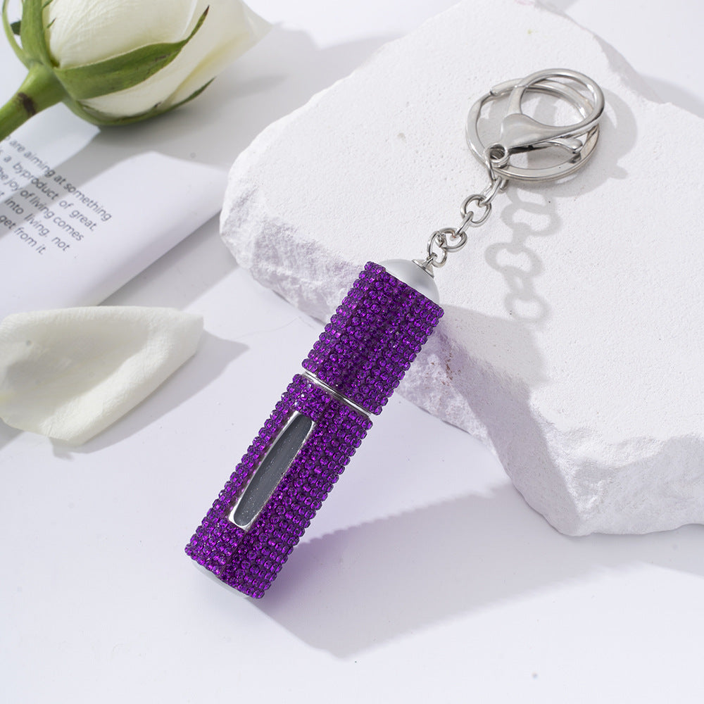 Wholesale  diamond-studded creative perfume bottle keychain is easy to carry